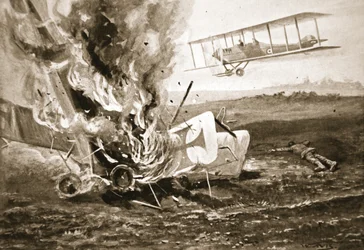 Second-Lieutenant Patrick kurz vor der Landung neben einem deutschen Flugzeug, das er abgeschossen hatte